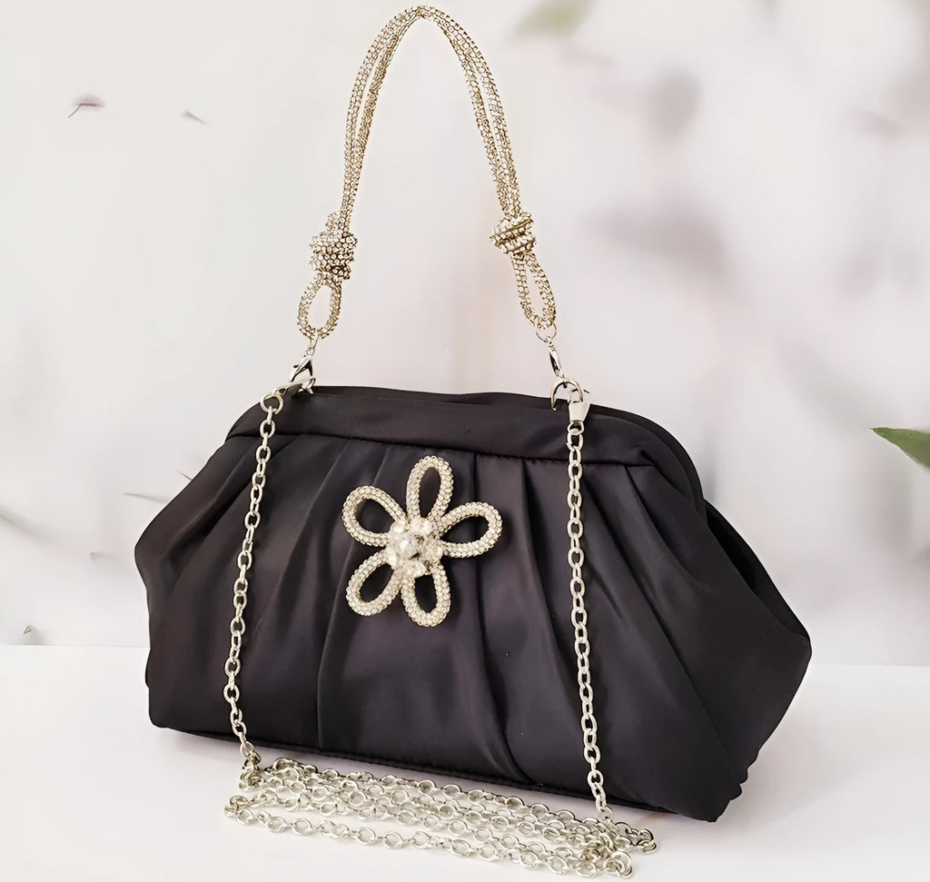 Women's soft shell-shaped polyester messenger bag in black with decorative chain and diamond details