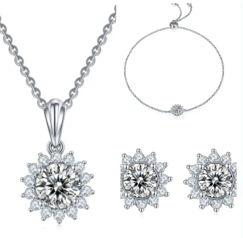 925 silver three piece jewellery set with moissanite pendant, stud earrings, and bracelet on white background