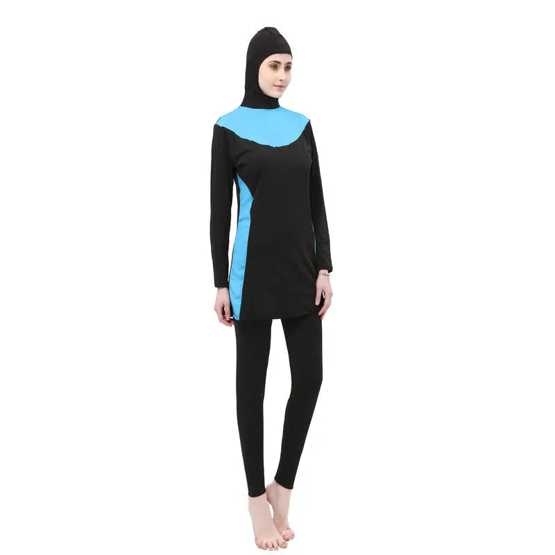 Conservative black women's swimsuit set with long sleeves, a hood, and separate pants.