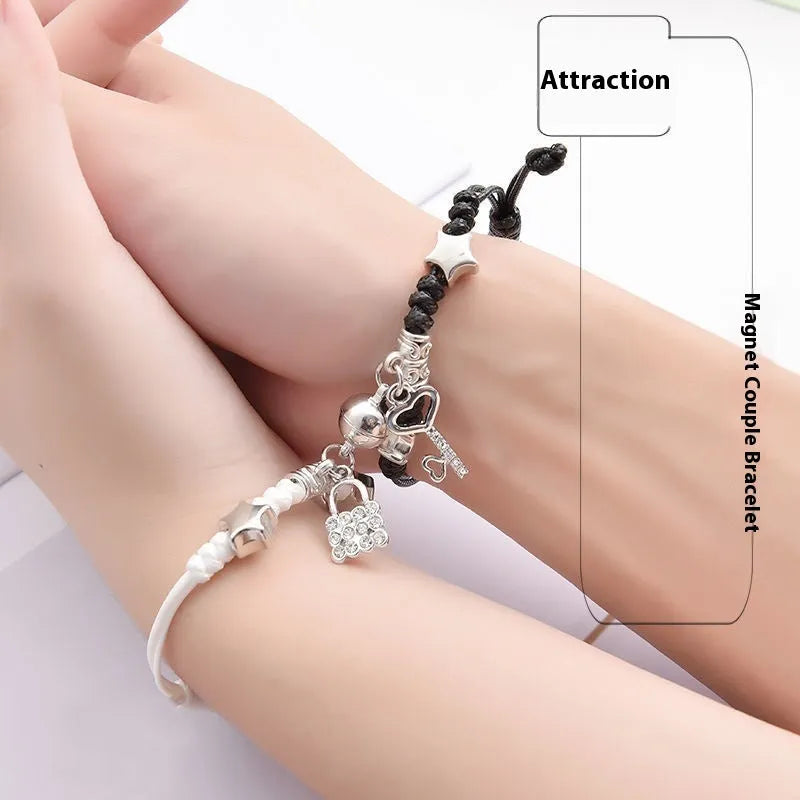 Alloy magnetic suction bracelet pair for couples with symbolic design options