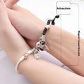Alloy magnetic suction bracelet pair for couples with symbolic design options