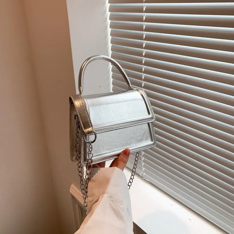 Retro style PU crossbody bag in six colour options with sewing line detailing