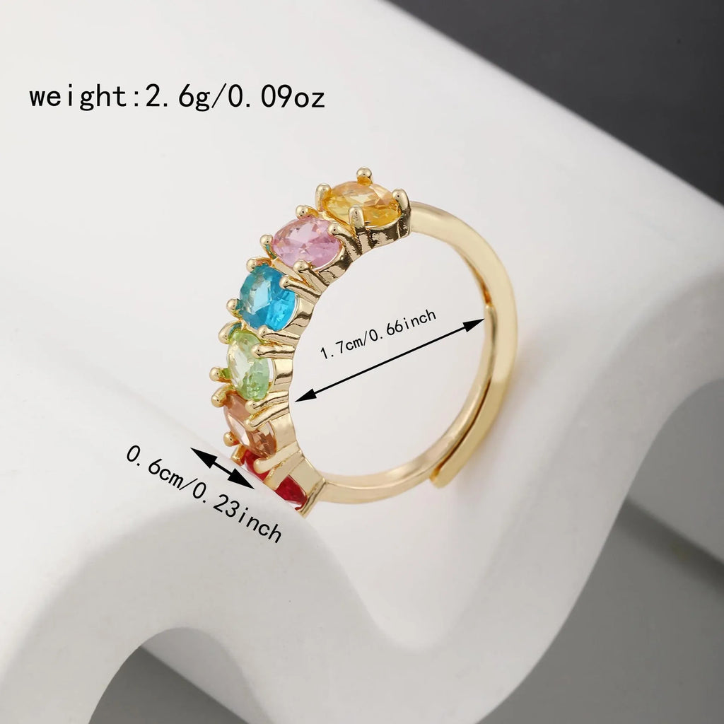 Women's gold-colour adjustable ring with zircon stones on a simple retro-style band.