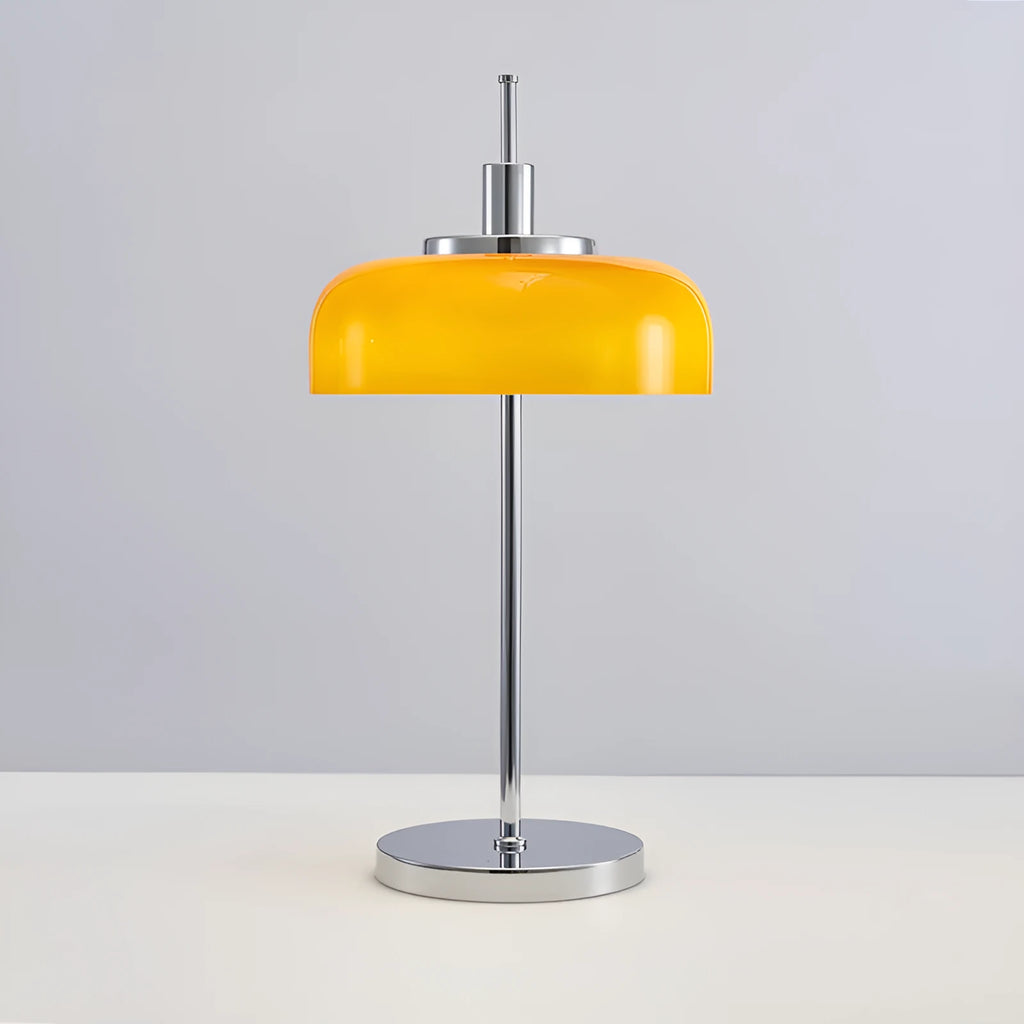 Retro table lamp with glass lampshade and chrome finish on a wooden surface