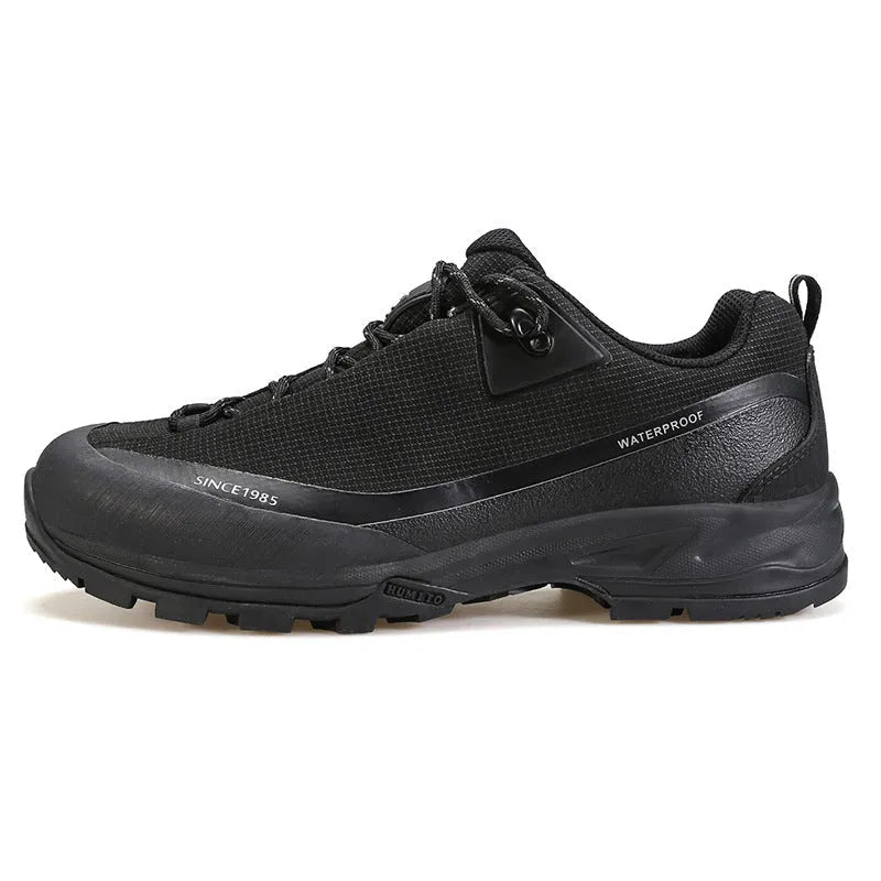 Men's low-top leather mesh hiking boots with front laces and a non-slip rubber outsole