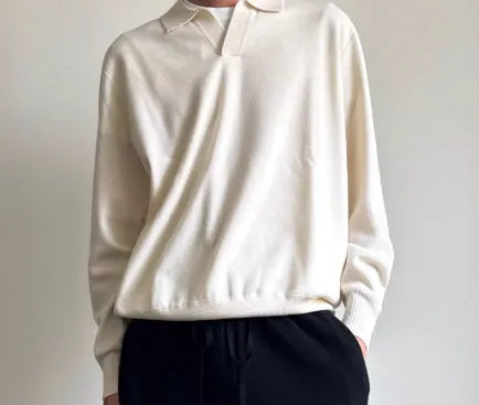 Old Money style pure wool polo sweater with lapel collar in loose fit, shown in navy blue colour.