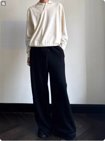 Old Money style pure wool polo sweater with lapel collar in loose fit, shown in navy blue colour.