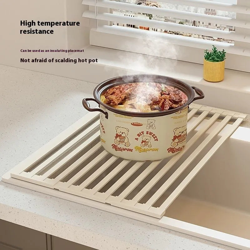 Foldable milky white stainless steel kitchen draining rack shown open and closed, with size options from 32cm to 55cm wide.