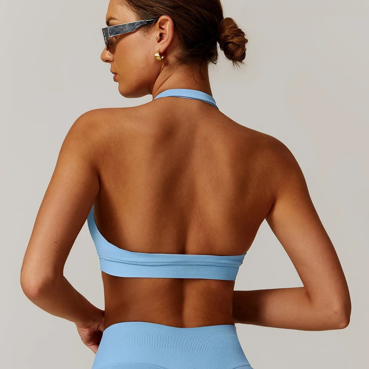 Women's halter neck yoga sports bra with medium support in five colour options