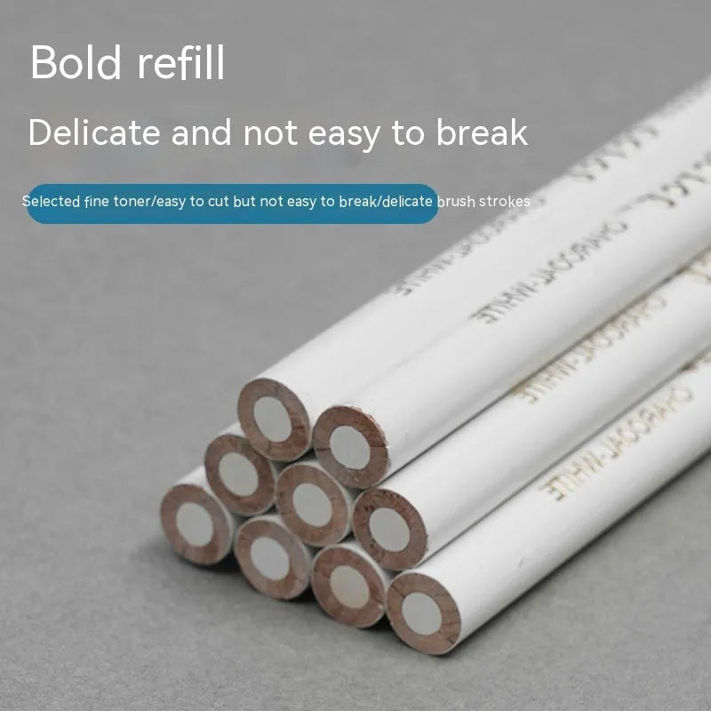 Three white charcoal pencils in wooden casings for art sketching on dark paper