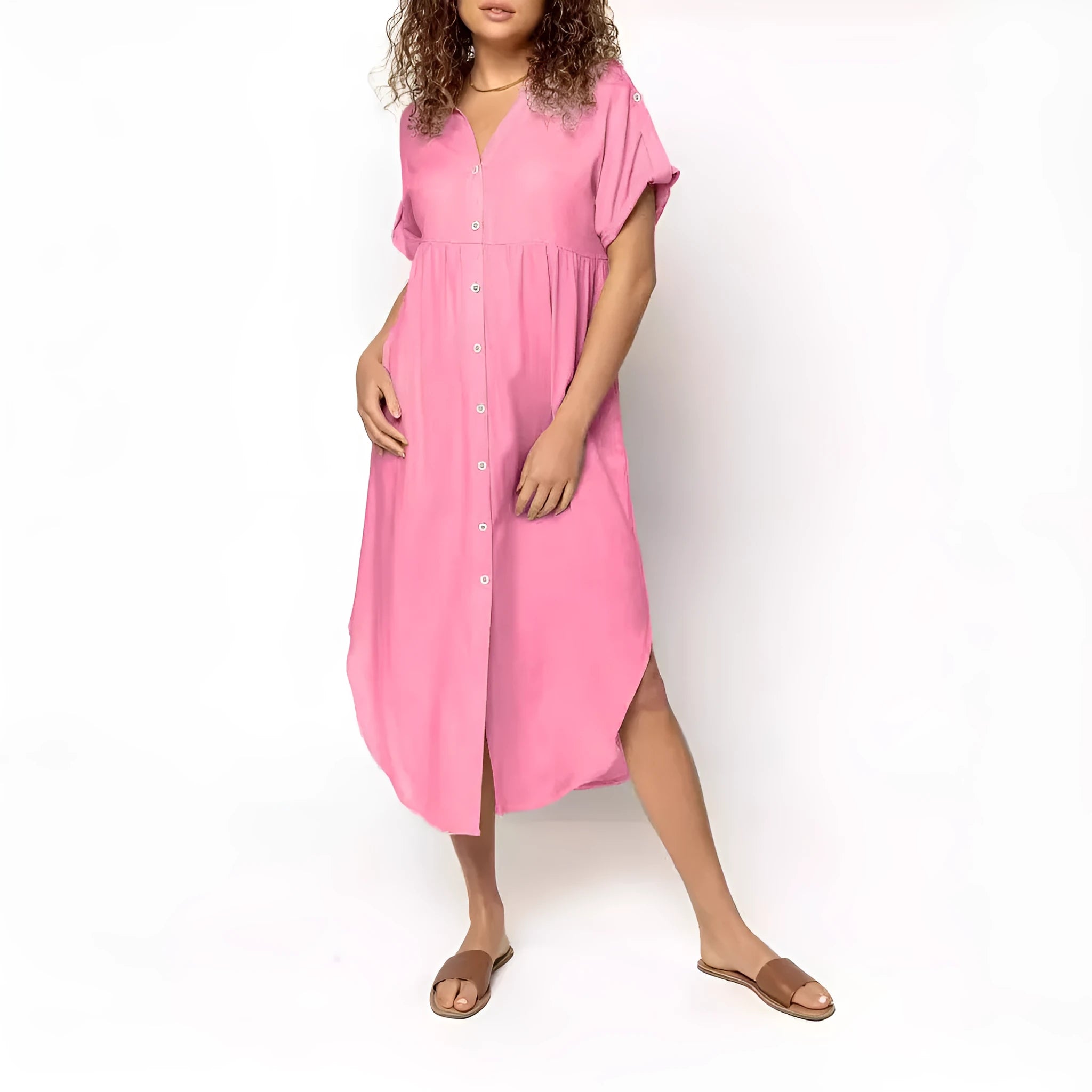 Casual solid colour mid-length dress with button front closure on a hanger.