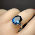 London Blue Topaz ring in deep dark blue crown cut on 925 silver with white gold plating adjustable opening