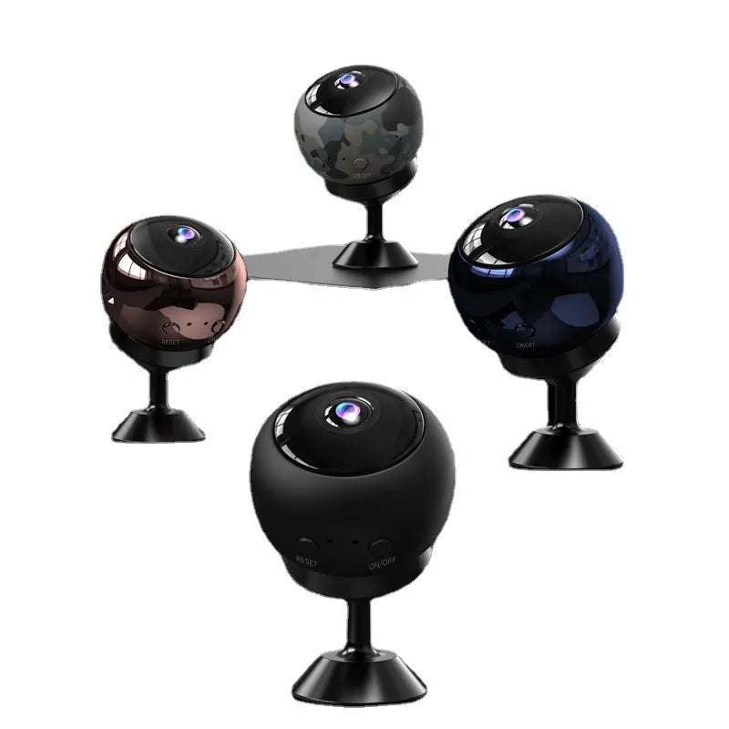 White indoor 1080p Wi-Fi security camera with USB cable on a table.