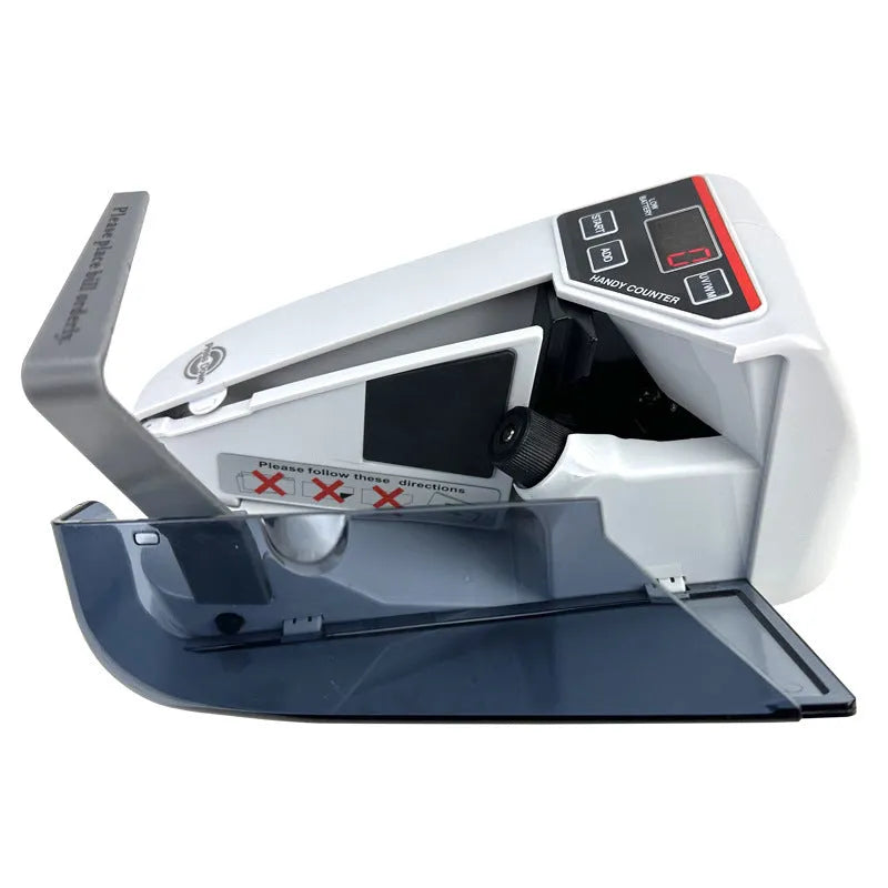 V31 foreign currency counting machine with purple light detector and LED display on a desk