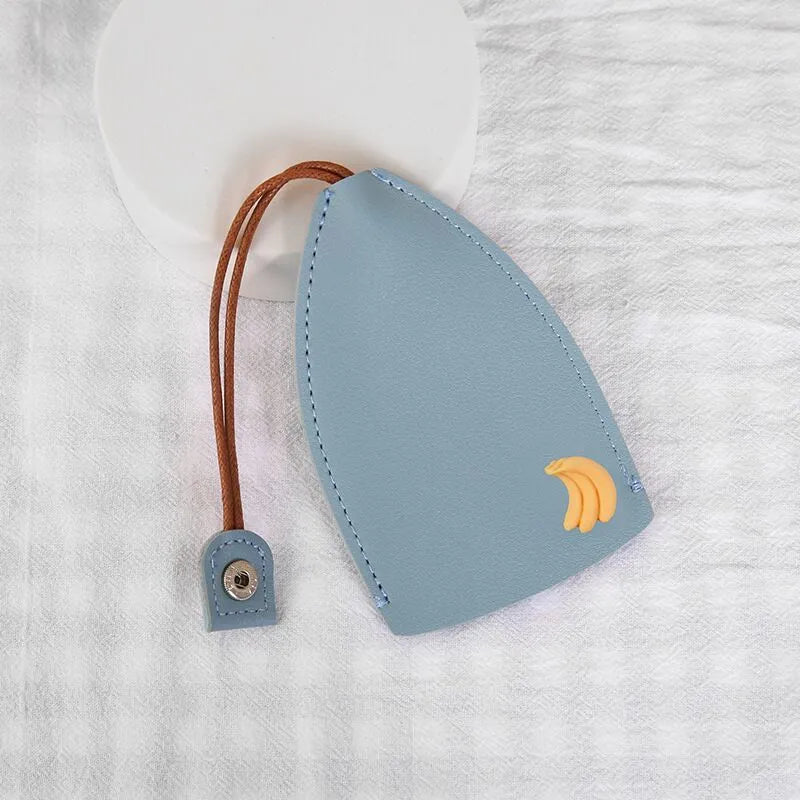 Cartoon design pull-out key case for car keys in PU leather.