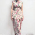 Long sleeve printed chiffon dress and top set in pictured colour on a hanger.