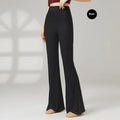 Women's solid colour dance practice pants in stretch polyester fabric on a hanger.