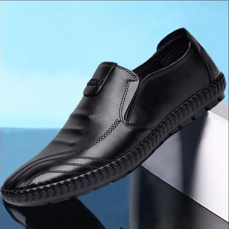 Men's black and brown leather-style business shoes with plain toe and flat heel.