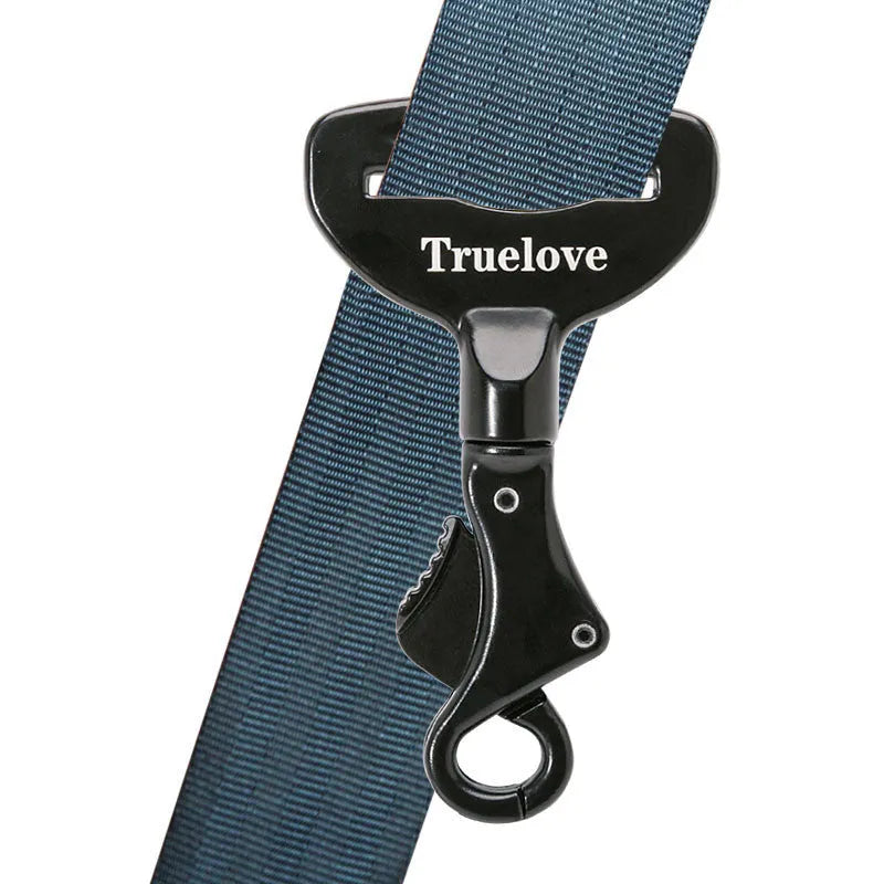 Black aluminium alloy pet car safety buckle with clip on a car seat belt