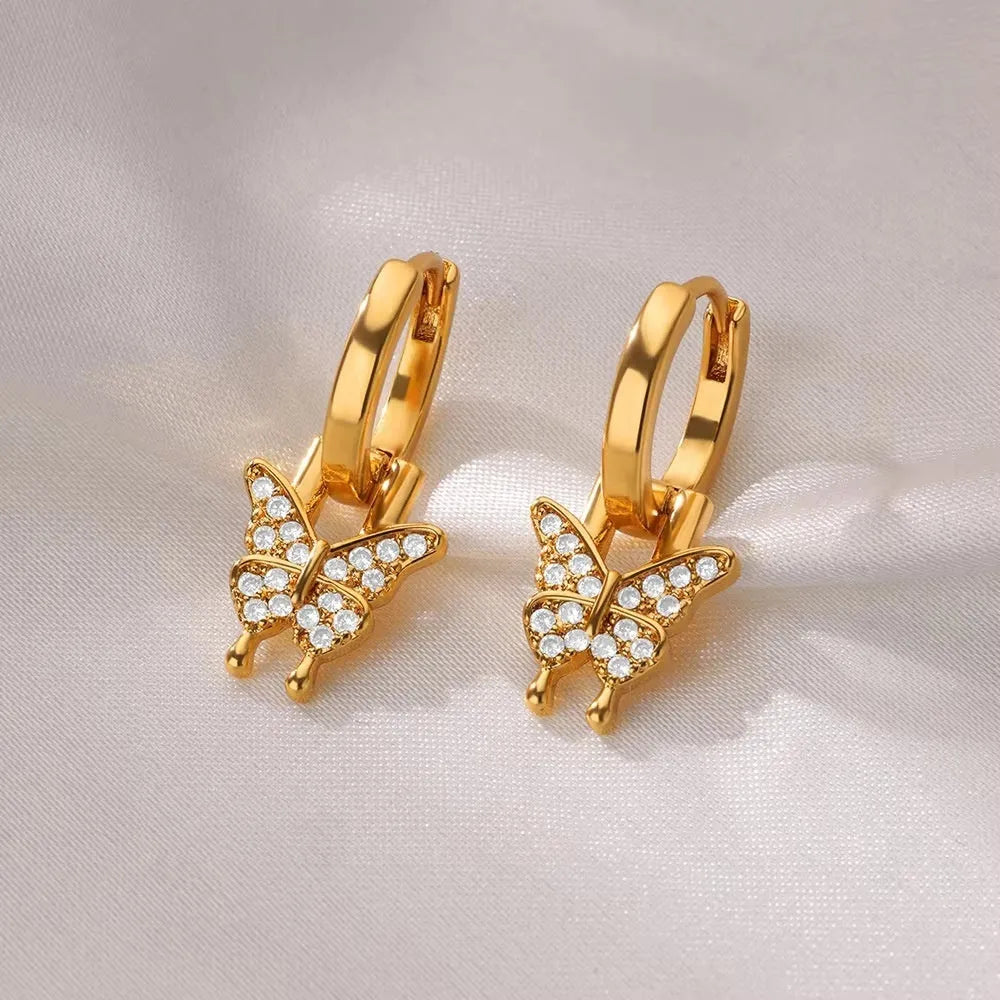 Women's copper geometric butterfly earrings with heart, star, and bow details in multiple colour options.