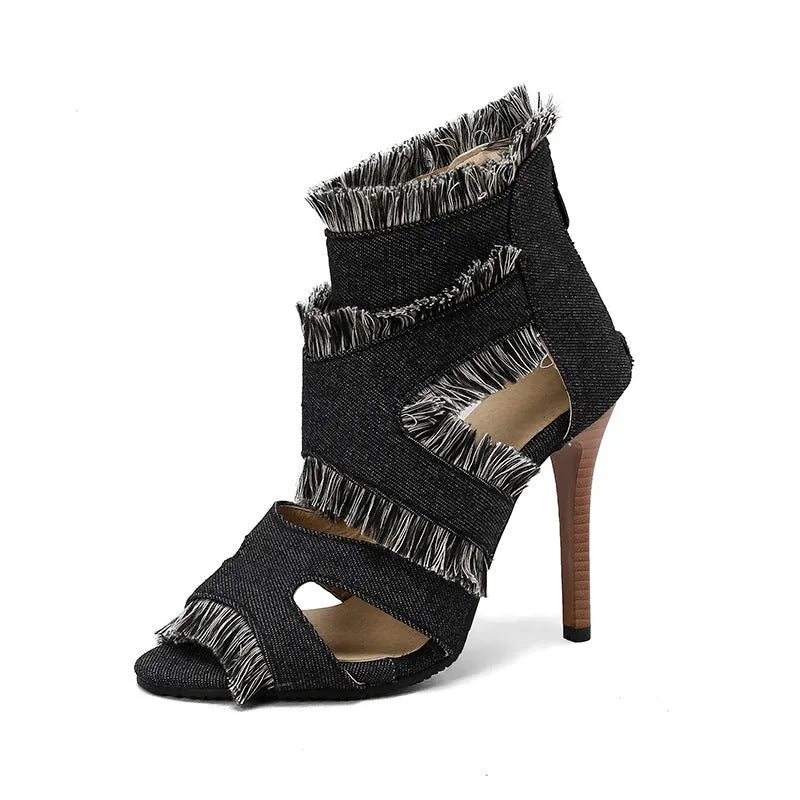 Woman wearing dark blue denim high heel sandals for summer, plus size fit with extended sizing options