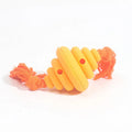 Green and yellow split oval dog ball with attached rope, a treat-dispensing chew toy