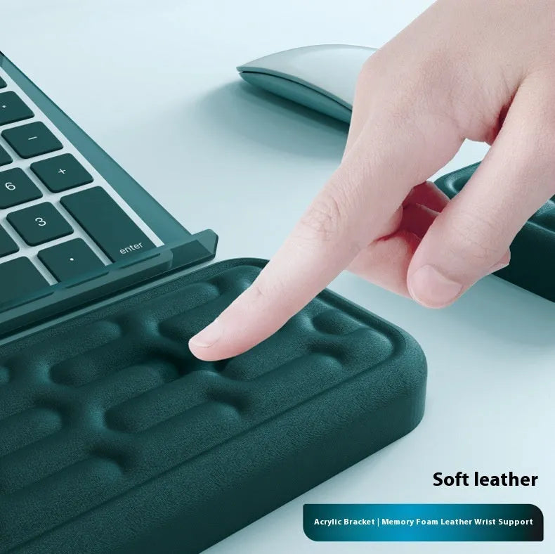 Double-sided keyboard and mouse pad with memory foam base, wrist support, and resin surface.
