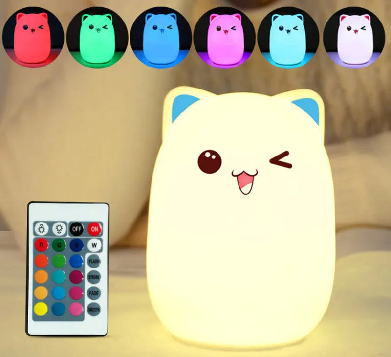 Cartoon silicone clapping lamp in Princess Bear style showing warm white light on a wooden table