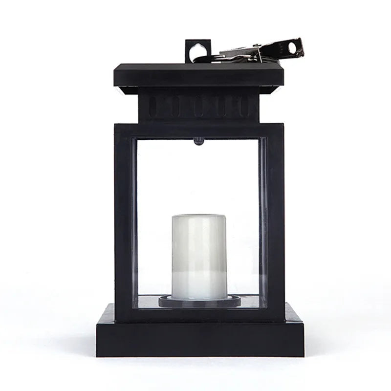 Solar LED candle light with black plastic shade, monocrystalline silicon panel, and IP44 waterproof rating for outdoor garden use