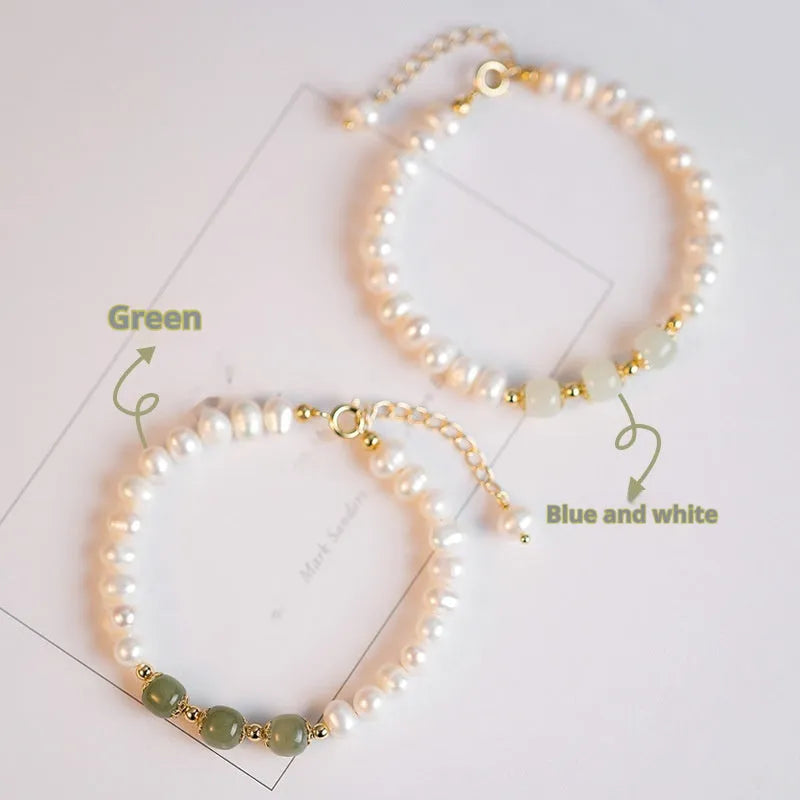 Korean style bracelet with diamond-shaped freshwater pearls in Hetian jade colour on a wrist.