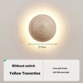 Vintage semicircle wall lamp with yellow cave stone shade and iron mounting