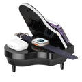 Black multi-function Bluetooth speaker with wireless charger and phone holder on a desk