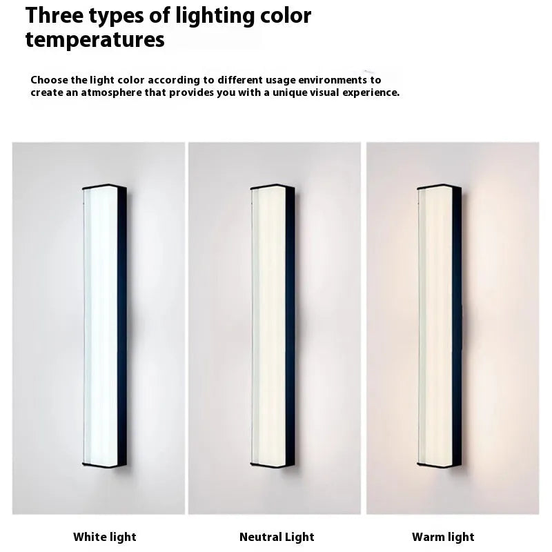 Modern outdoor wall lamp mounted on stone wall, showing clean lines and illuminated light source.
