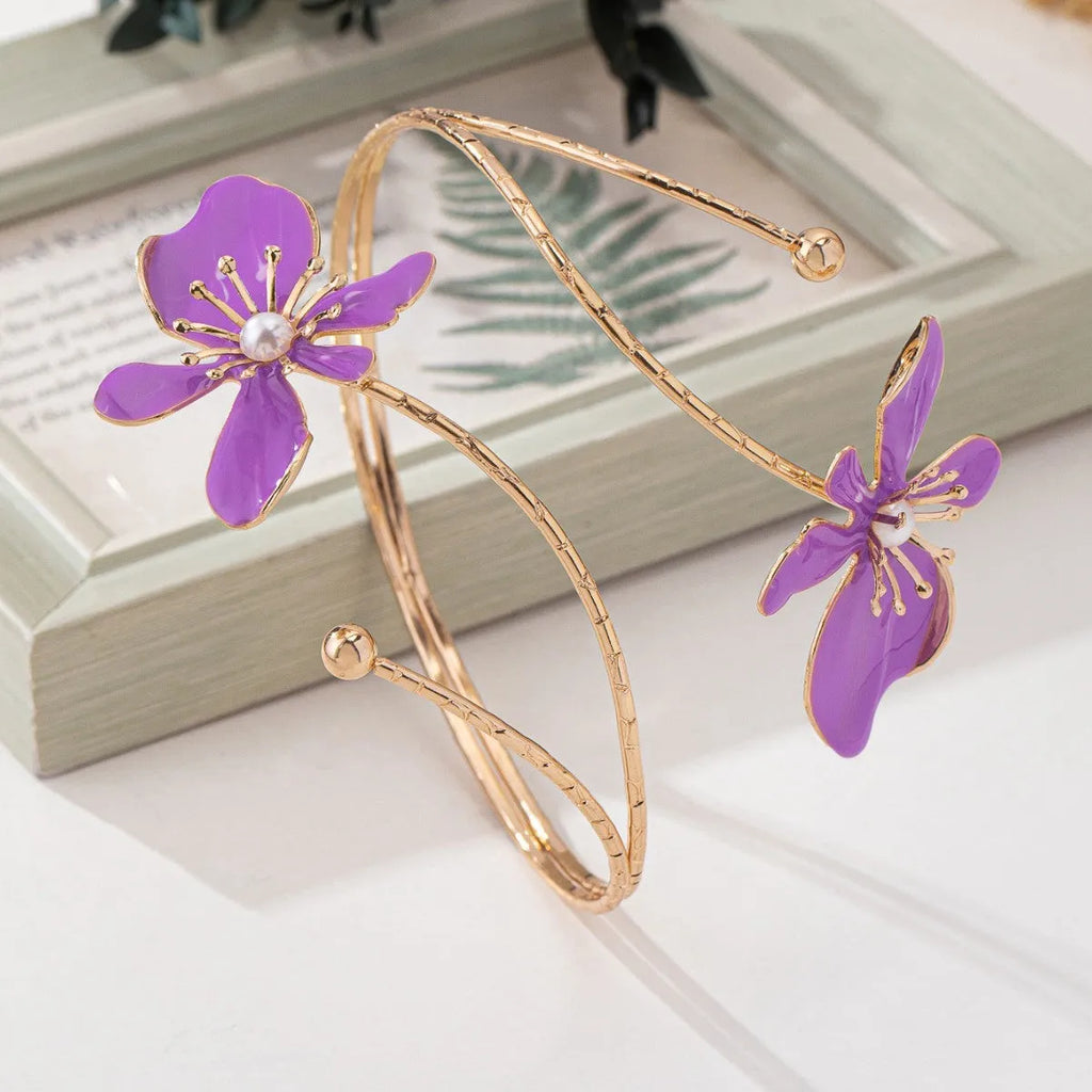Alloy armband with hollow line pattern in pink or purple metallic finish
