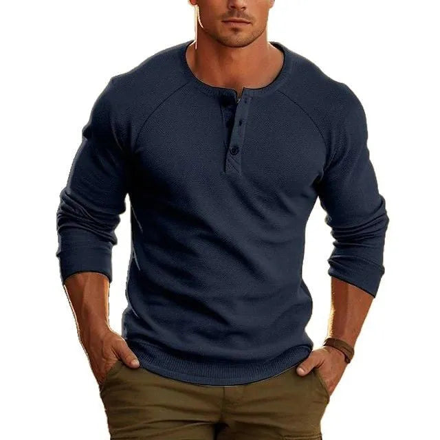 Men's white long-sleeved shirt with a Henry collar, showing collage stitching detail on the front.