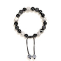 Black agate volcanic rock bracelet with diamond-cut facets, shown in two width sizes.