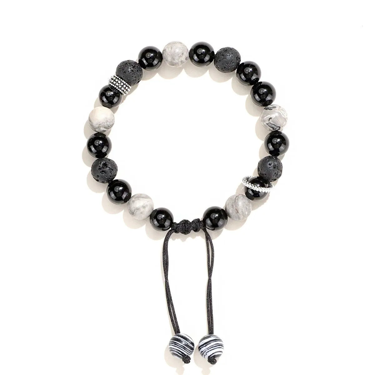 Black agate volcanic rock bracelet with diamond-cut facets, shown in two width sizes.