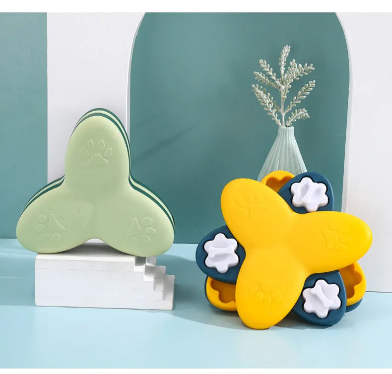 Green dog puzzle toy with bone-shaped covers showing nine compartments for treat dispensing