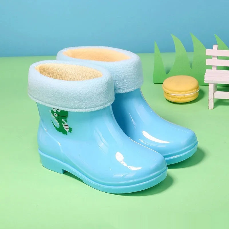 Children's non-slip plastic rain boots in solid colour with mid-calf height, available in multiple sizes