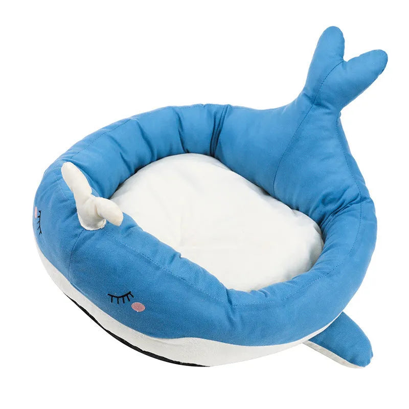 Blue duck-shaped fluffy pet bed for small dogs and cats on a floor