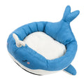 Blue duck-shaped fluffy pet bed for small dogs and cats on a floor