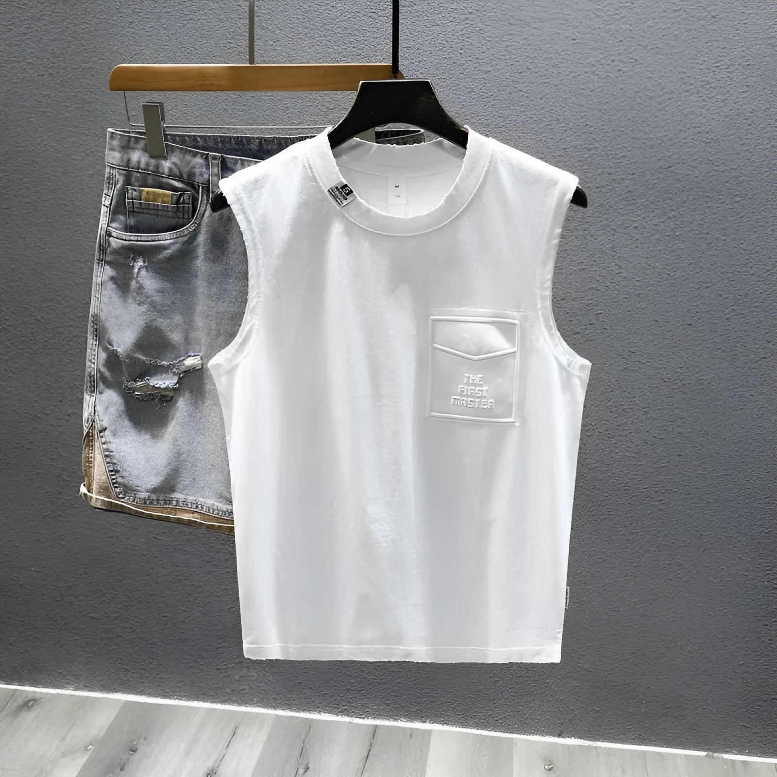 Cotton sleeveless t-shirt in loose fit with straight hem, black and white colour options