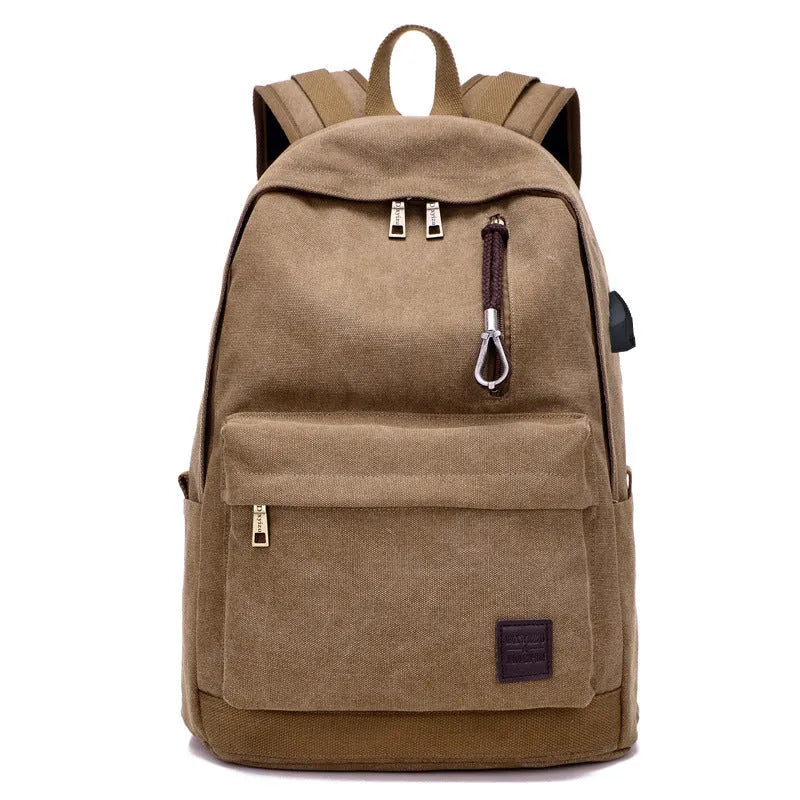 Canvas backpack with USB charging port and multiple pockets including a laptop compartment
