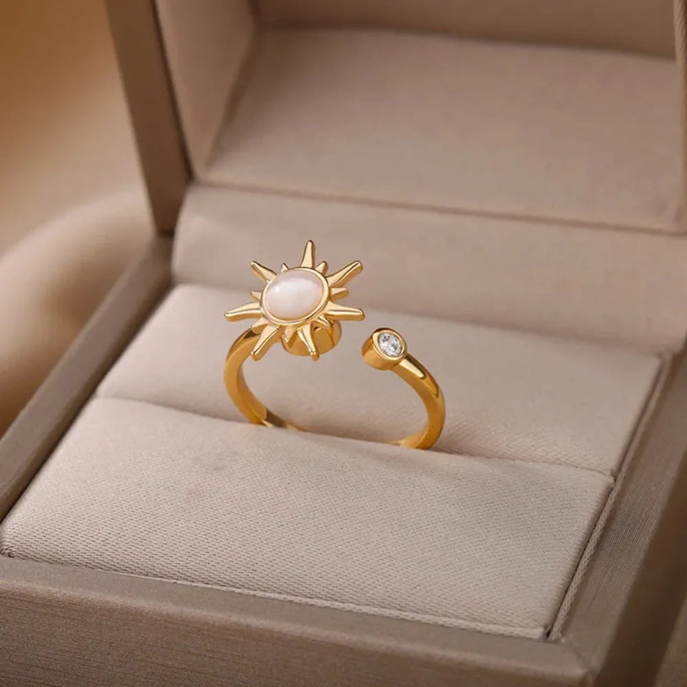 Gold electroplated copper rotatable decompression ring with geometric design and adjustable opening