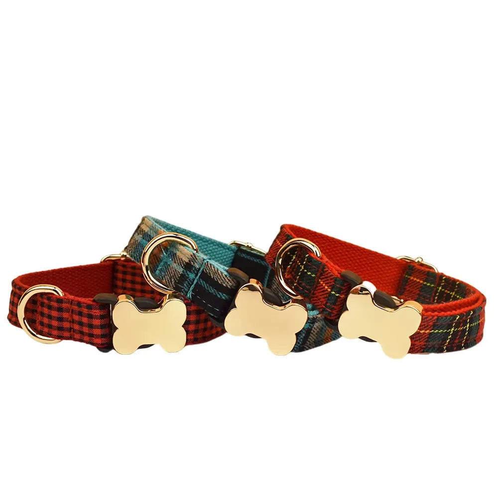 Flat nylon dog collar with printed grid pattern and a white bone-shaped buckle on a red background.
