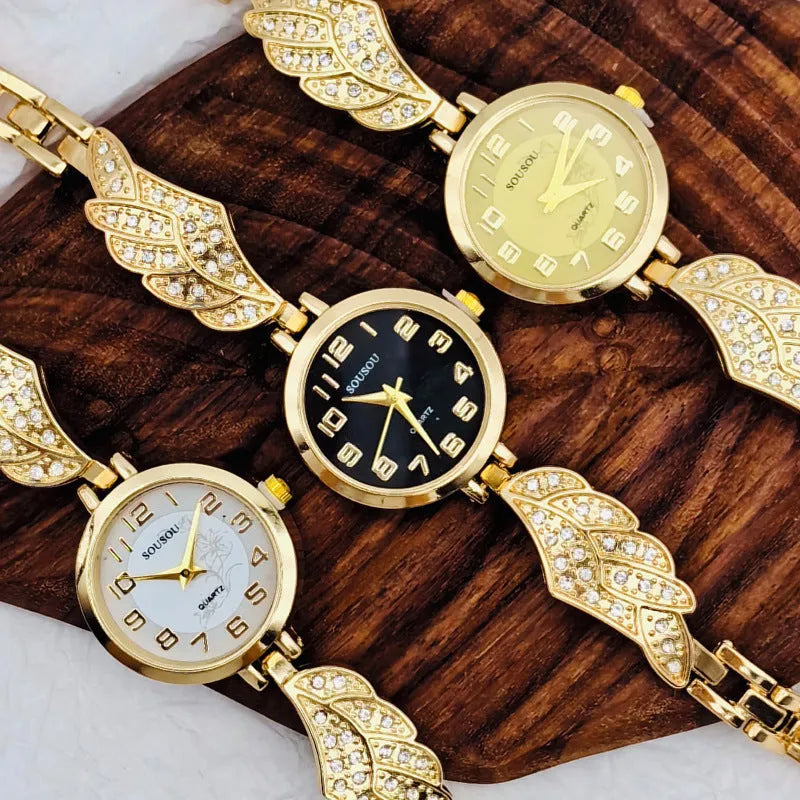 Women's stainless steel watch with round dial showing gold face colour option on wrist.