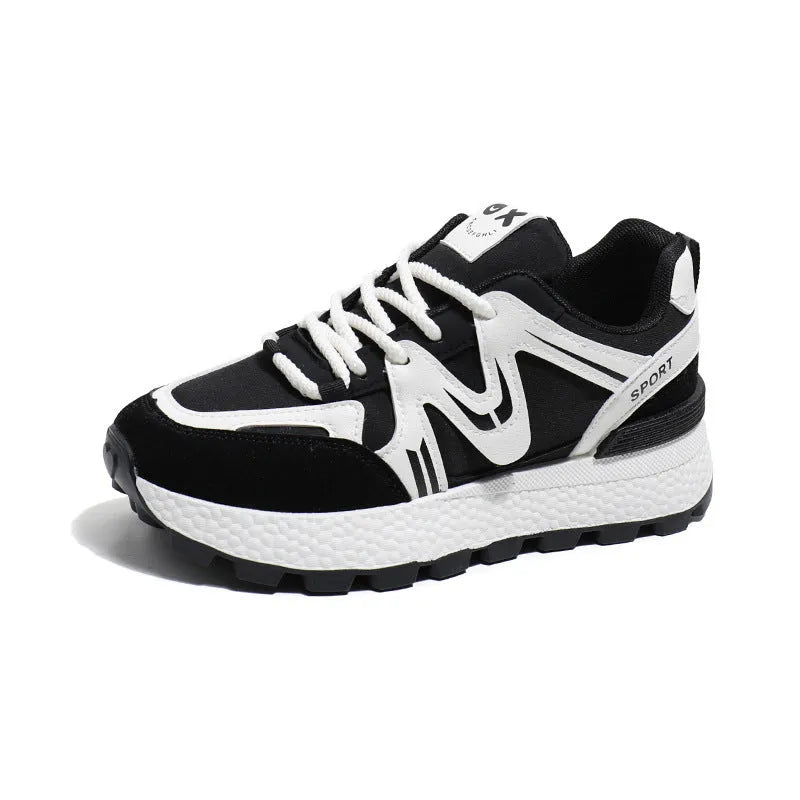 Women's flat-heel casual sports shoes in black with round toe and front lace-up design.