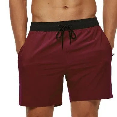 Men's blue stitching waist athletic shorts with zipper pocket and drawstring for running fitness