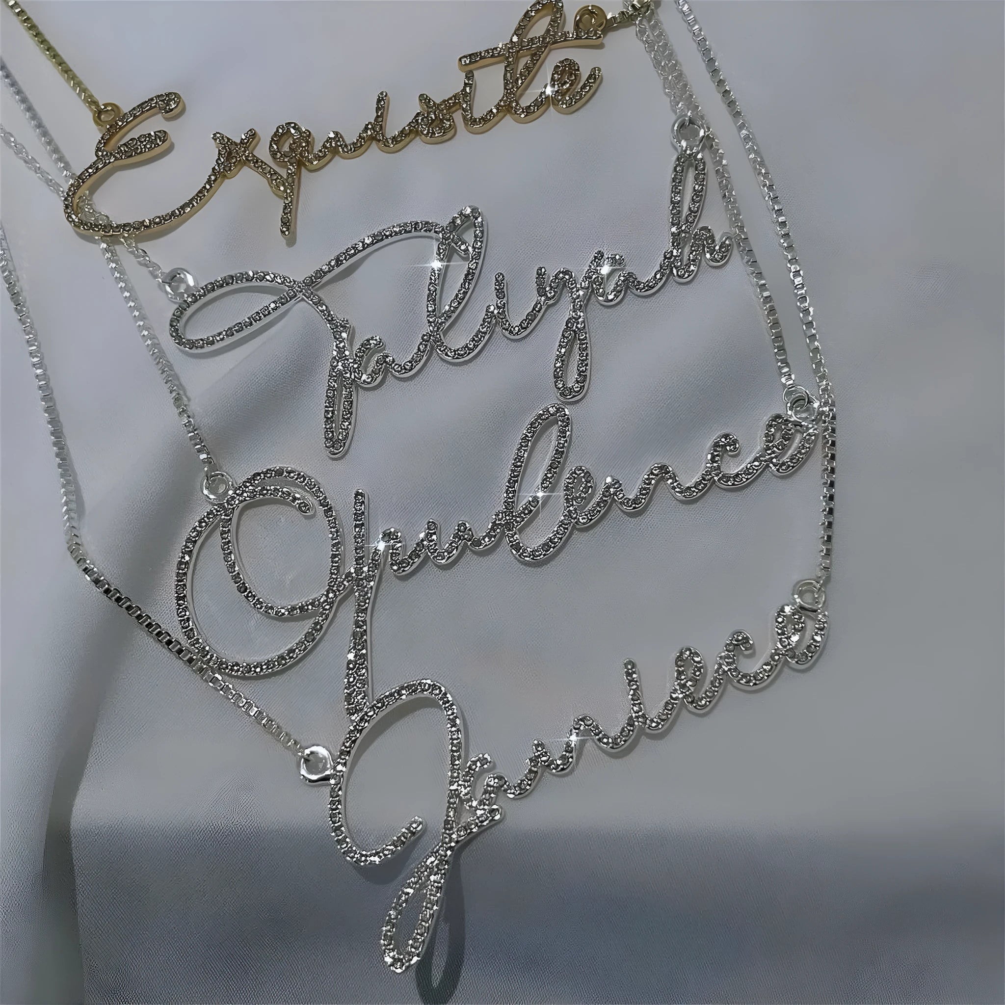 Stainless steel diamond-studded name necklace in gold with letter pendant on 41-50cm chain