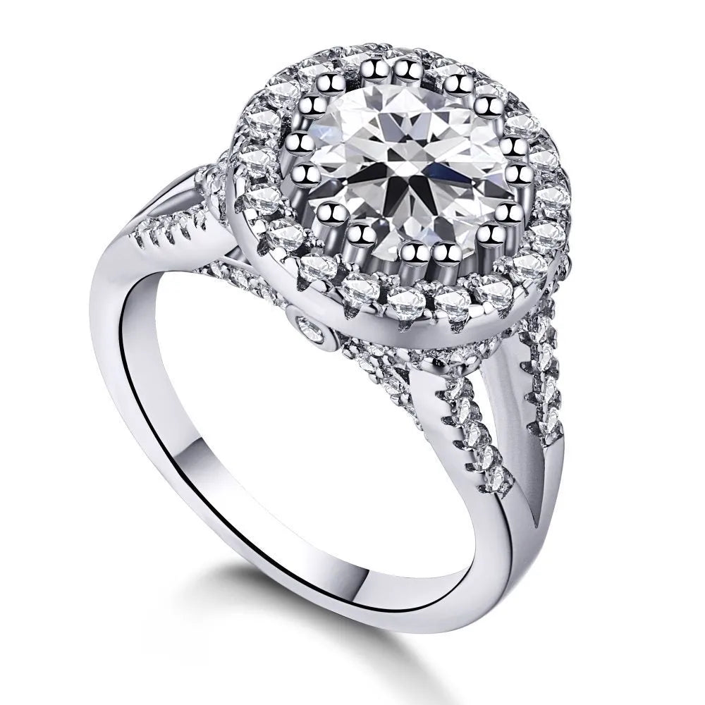 Silver ring with round rhinestone zircon centre on a plain background, women's affordable luxury style